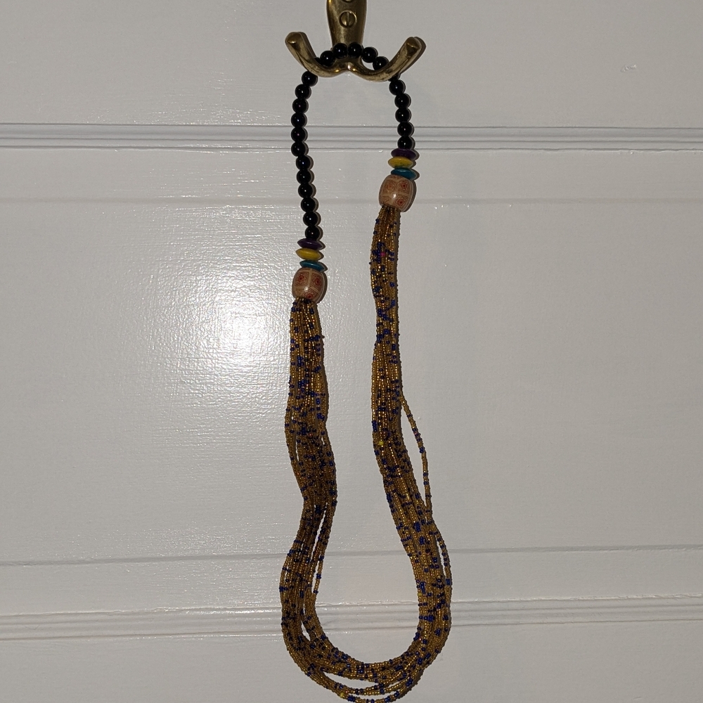 Blue and gold beaded necklace